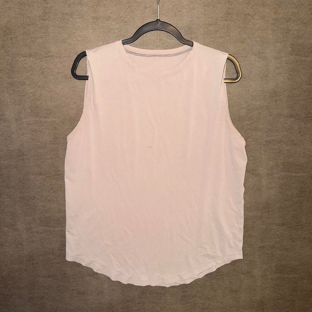 Lululemon light/blush pink tank top with a relaxed fit